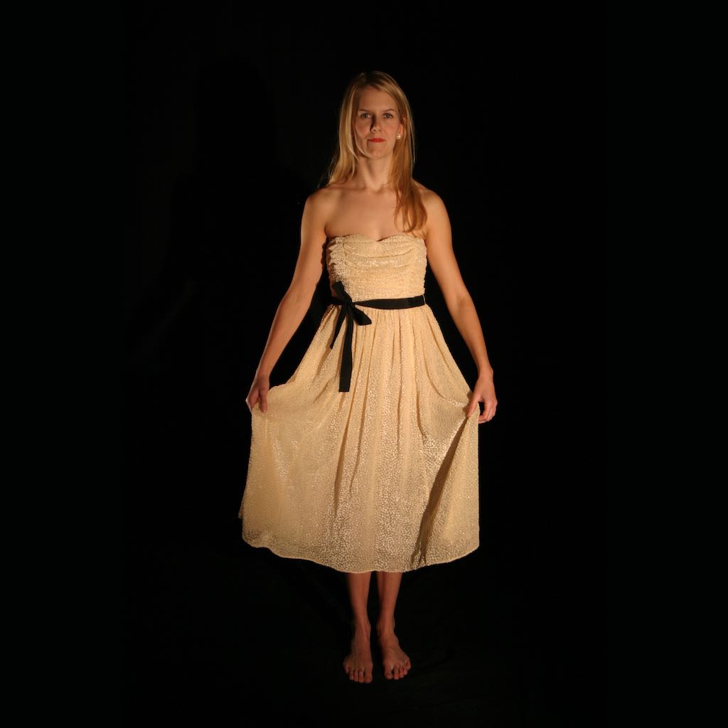 Thumbnail image of video artwork In the Music Box, featuring a young girl staring at a music box